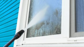 professional tools being used for exterior window cleaning
