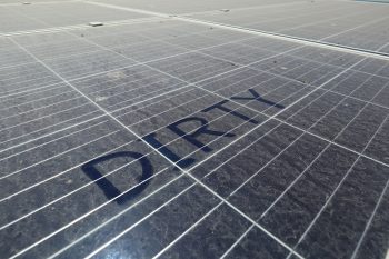 dirty solar panel that needs solar panel cleaning done