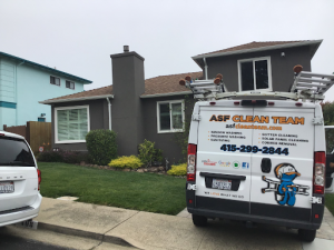 professional window cleaners cleaning after fire season