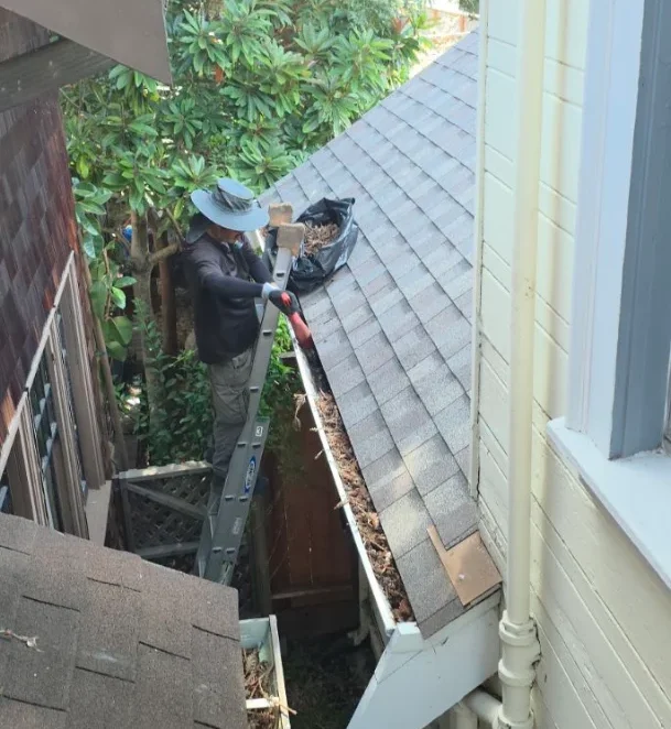 ASF Clean Team performing roof and gutter cleaning in Oakland